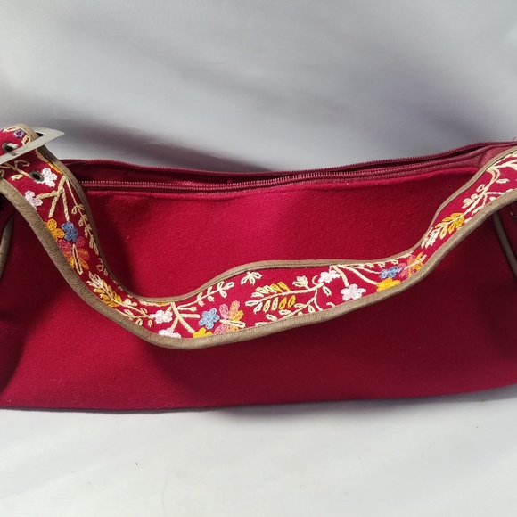 purse with embroidered strap